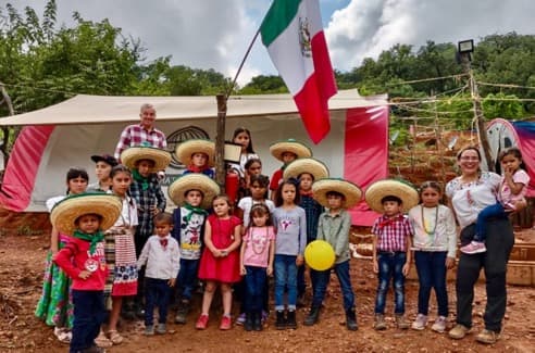 Community celebration with local school children in the Copalquin district